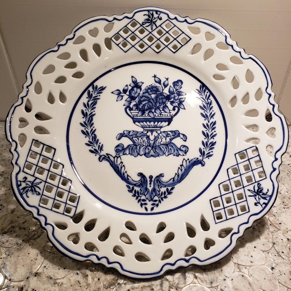 Lace patterned blue on white plate.